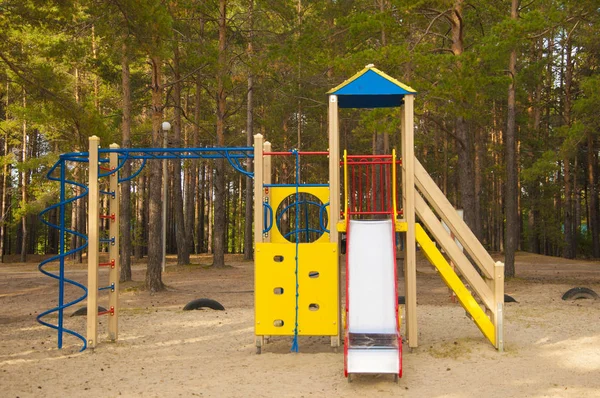 Kids playground in the forest — Stock Photo, Image