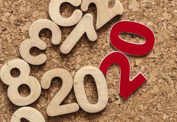 Šťastný Nový rok 2020 pozadí s mnoha čísly na korku backgrou — Stock fotografie