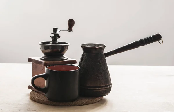 Hot turkish coffee pot on wooden table. — Stock Photo, Image