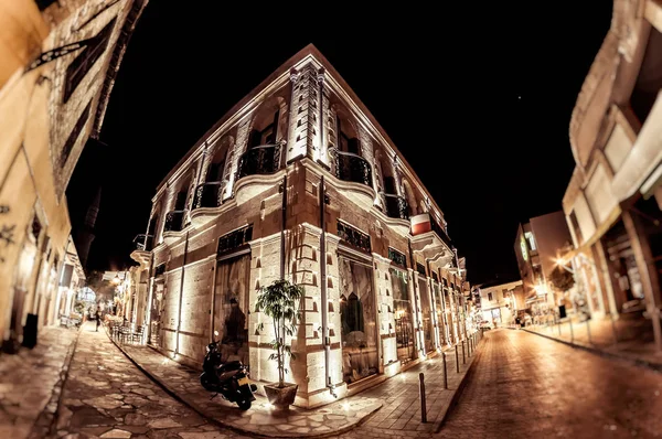 Old colonial style building at Agiou Andreou street at night. Limassol, Cyprus