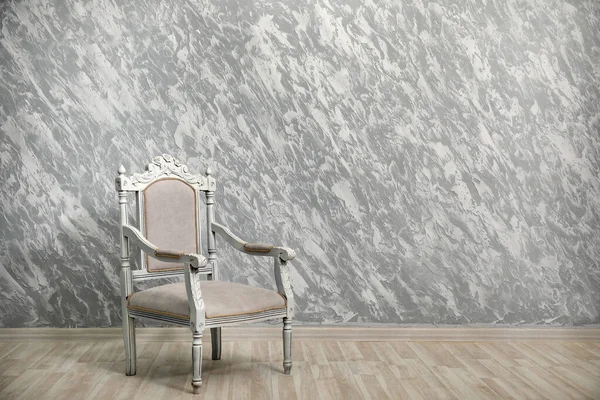 Vintage Chair Textured Gray Wall Royalty Free Stock Images