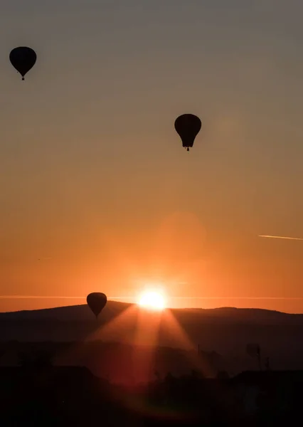 Hot air balloons silhouette in beautiful sunset. Freedom  and travel concept.