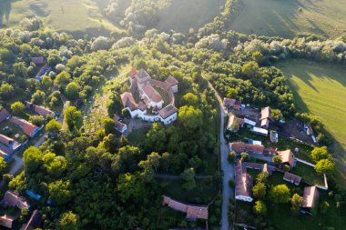Saxon Village Viscri in Transylvania, Romania. Aerial view from a drone. clipart