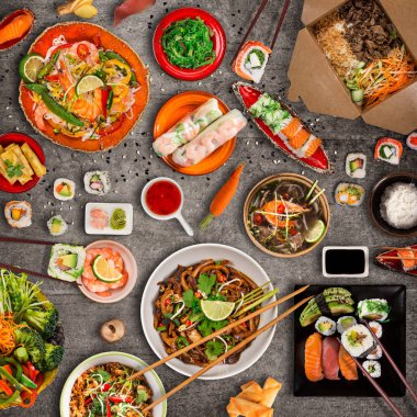 Various of asian meals on rustic background , top view , place for text. clipart