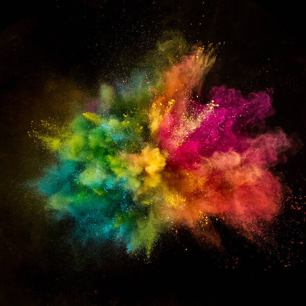 Взрыв цветного порошка на черном фоне. Замерзание.