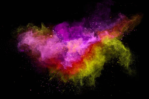 Colored powder explosion on black background. — Stock Photo, Image