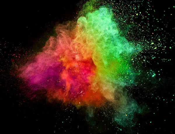 Colored powder explosion on black background. — Stock Photo, Image