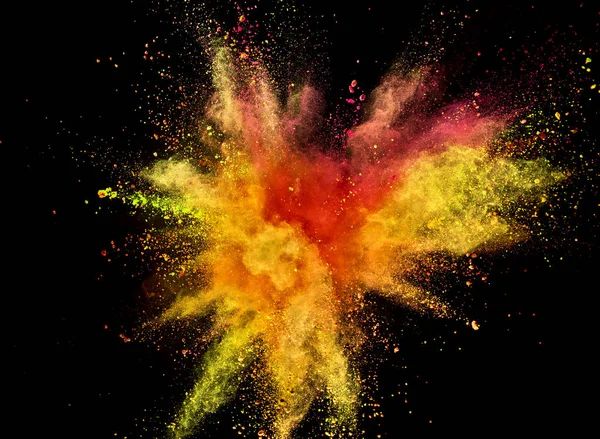 Siyah arka plan üzerine izole renkli toz patlama.