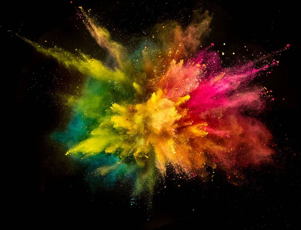 Farbiges Pulver Explosion isoliert auf schwarzem Hintergrund. — Stockfoto