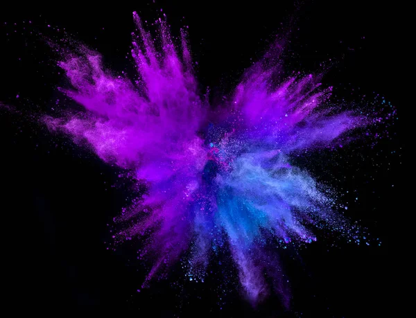 Colored powder explosion isolated on black background. — Stock Photo, Image