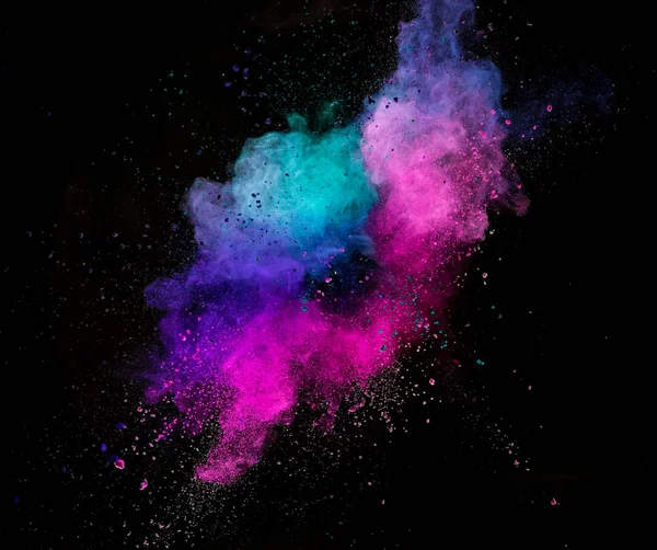 Colored powder explosion isolated on black background. — Stock Photo, Image