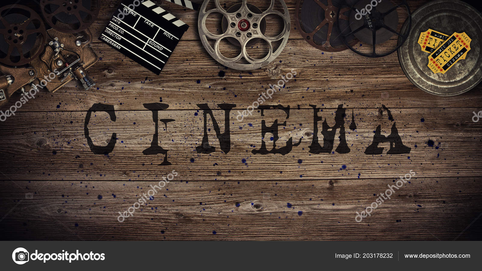 Cinema concept of vintage film reels, clapperboard and projector