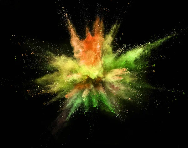 Colored powder explosion on black background. — Stock Photo, Image