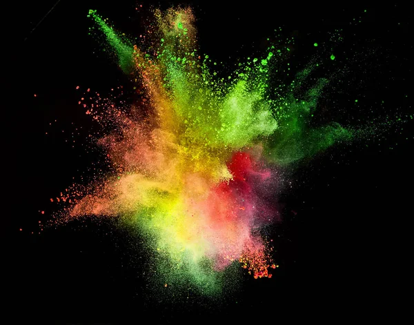 Colored powder explosion on black background. — Stock Photo, Image