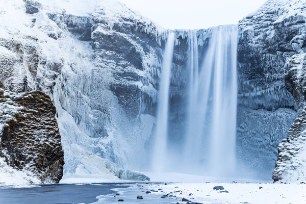 Beautiful Skogafoss waterfall in winter. Iceland.