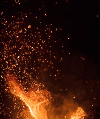 Burning sparks flying. Beautiful flames background. clipart