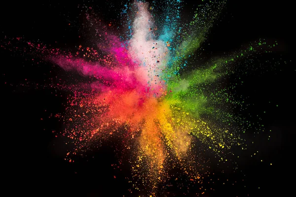 Colored powder explosion on black background. — Stock Photo, Image