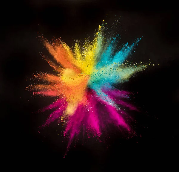 Colored powder explosion on black background. — Stock Photo, Image