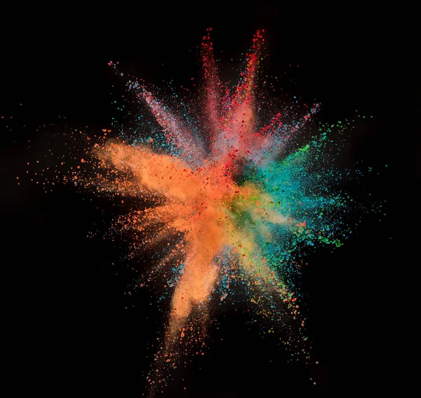 Colored powder explosion on black background. — Stock Photo, Image