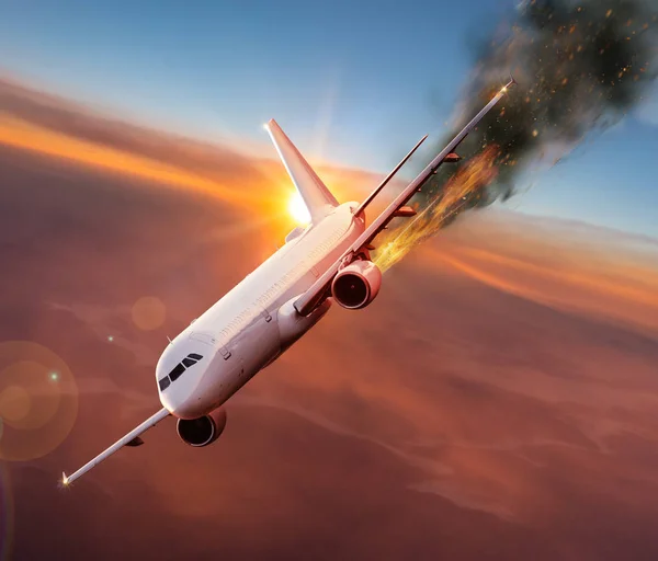 Airplane with engine on fire, concept of aerial disaster.