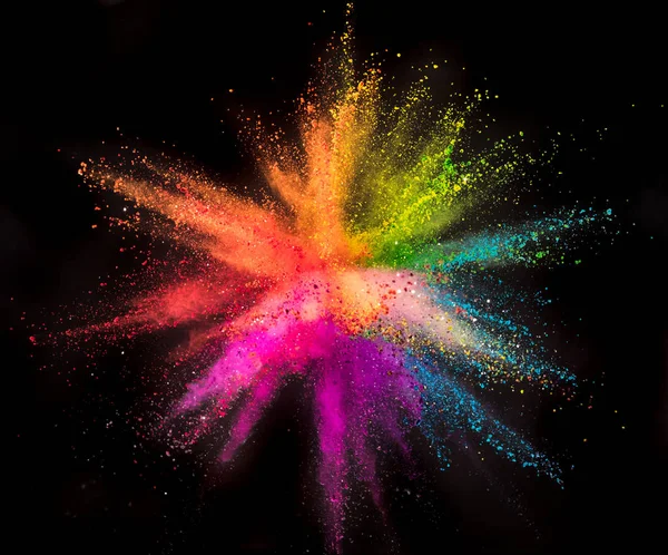 Colored powder explosion on black background. — Stock Photo, Image