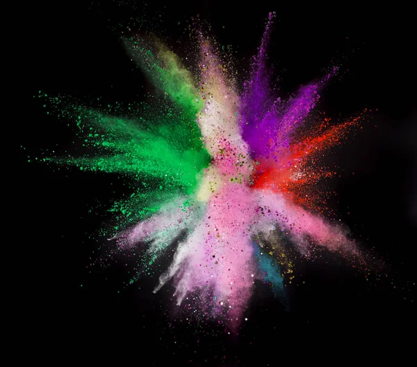 Colored powder explosion on black background. — Stock Photo, Image