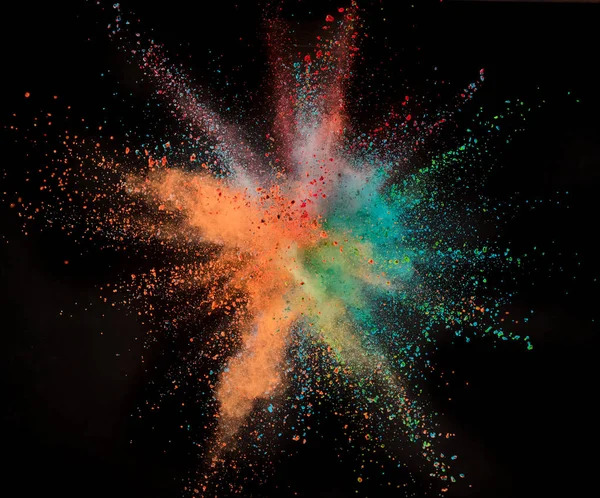 Gekleurde poeder explosie op zwarte achtergrond. — Stockfoto