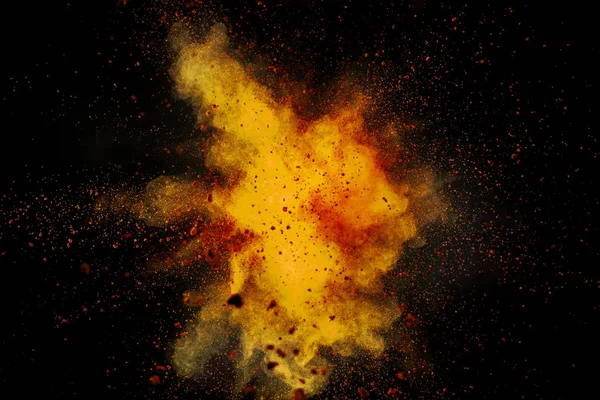 Explosão em pó colorido no fundo preto. — Fotografia de Stock