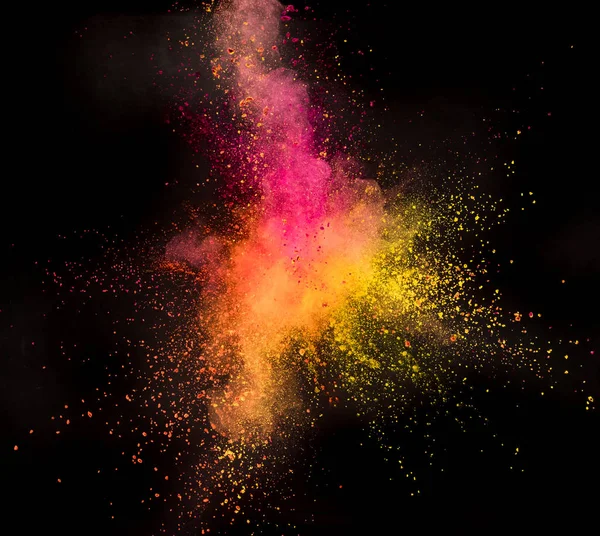 Explosion de poudre colorée sur fond noir. — Photo