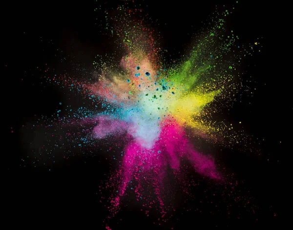 Colored powder explosion on black background. — Stock Photo, Image