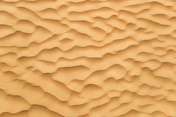 Détail d'une belle texture des vagues de sable du désert . — Photo