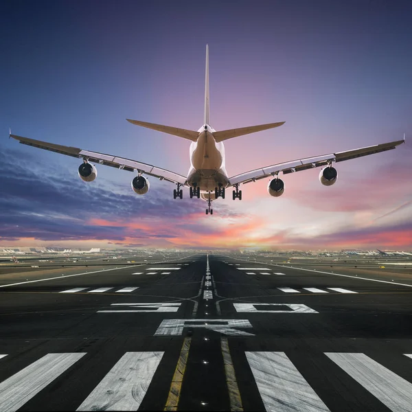 Airplane landing at the airport. — Stock Photo, Image