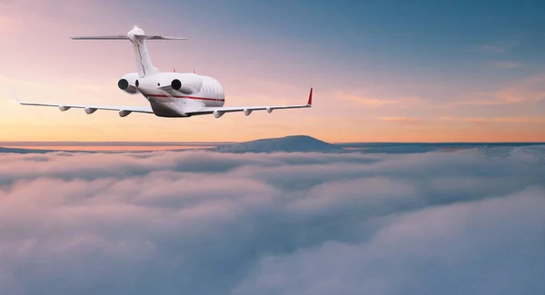 Small private jetplane flying above beautiful clouds. — Stock Photo, Image