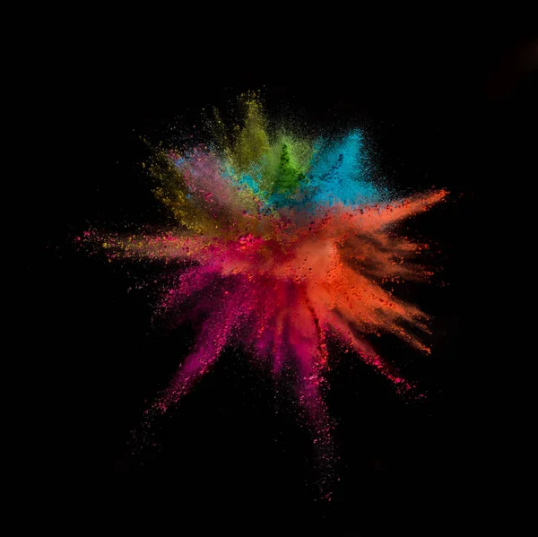 Colored powder explosion on black background. — Stock Photo, Image