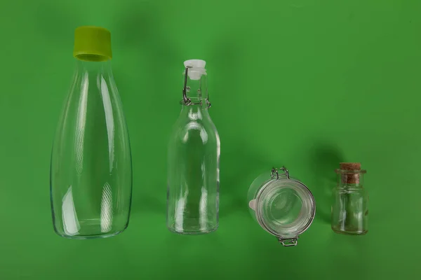 Zero Waste, plastic free, empty glass on green background. — Stock Photo, Image