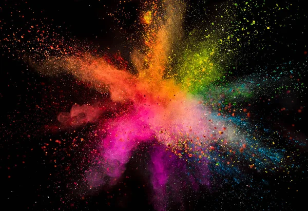 Colored powder explosion on black background. — Stock Photo, Image