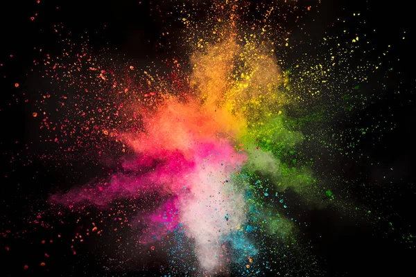 Colored powder explosion on black background. — Stock Photo, Image