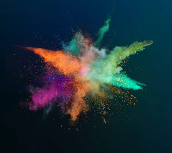 Colored powder explosion on dark gradient background. — Stock Photo, Image