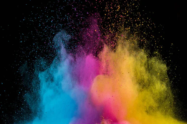 Colored powder explosion on black background. — Stock Photo, Image