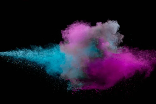 Colored powder collision on black background. — Stock Photo, Image