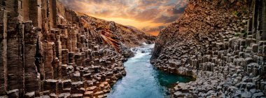 Breathtaking view of Studlagil basalt canyon, Iceland. clipart