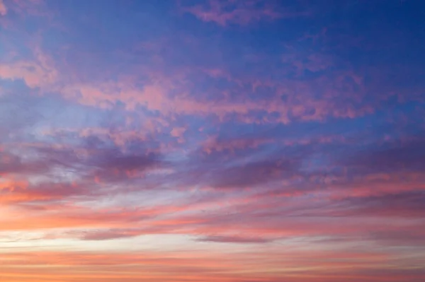 Sunset or sunrise sky with dramatic clouds — Stock Photo, Image