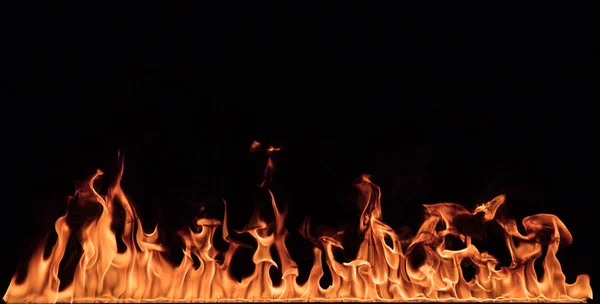 Textur des Feuers auf schwarzem Hintergrund. — Stockfoto