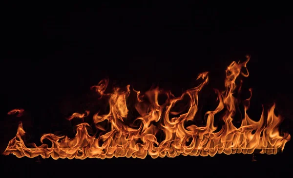 Textur des Feuers auf schwarzem Hintergrund. — Stockfoto