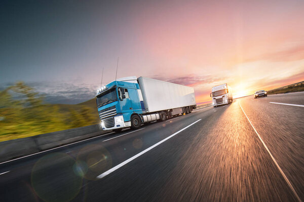 Truck with container on road, cargo transportation concept.