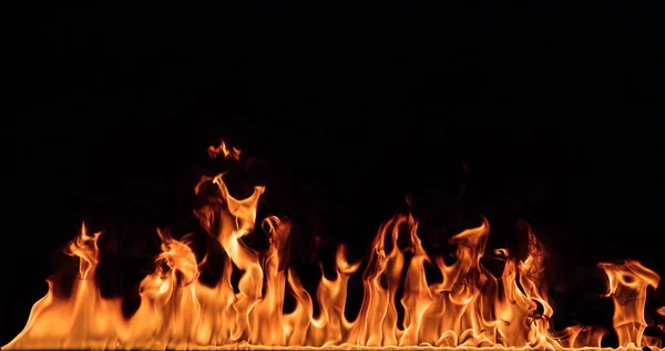 Textur des Feuers auf schwarzem Hintergrund. — Stockfoto