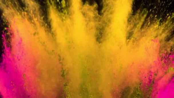 Colorful powder exploding on black background in super slow motion. — Stock Video