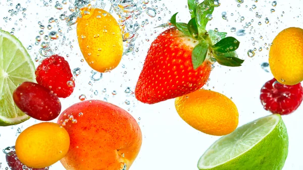 Freeze Motion Shot of Fresh Fruits falling into water — Stock Photo, Image