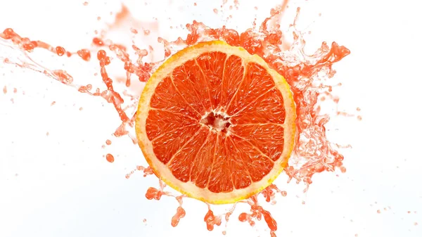 Grapefruitscheibe mit Spritzsaft — Stockfoto