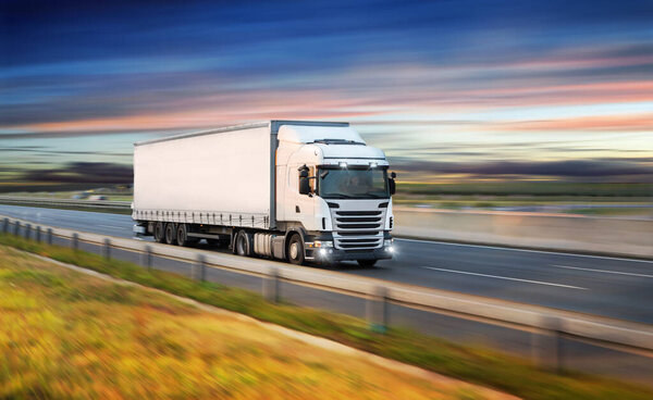 Truck with container on road, cargo transportation concept.